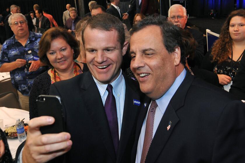 New Jersey Gov. Chris Christie, right, last month in Clive, Iowa, at a birthday party for Iowa Gov. Terry Branstad.