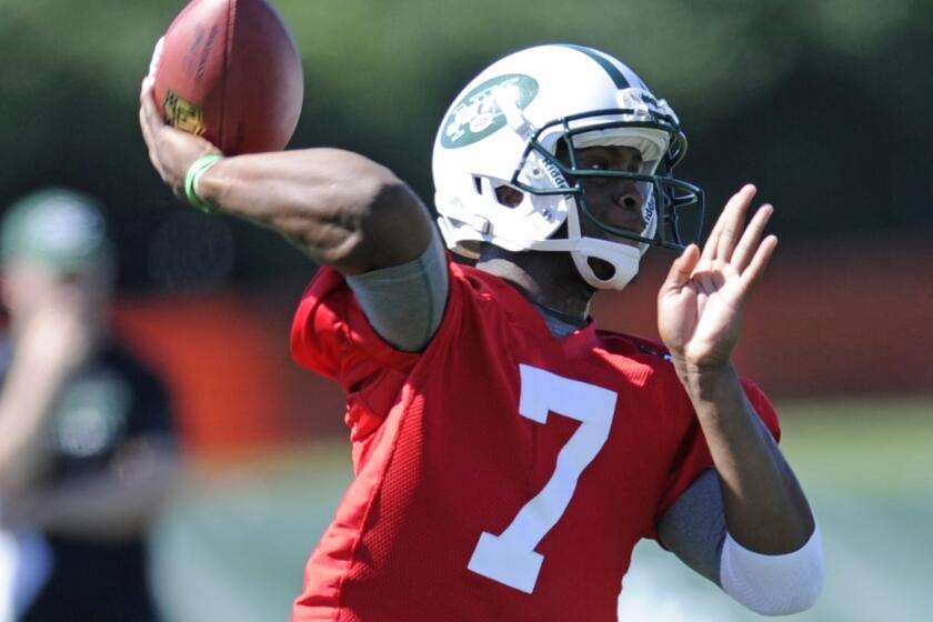 New York Jets quarterback Geno Smith, shown at training camp last month, threw four interceptions during practice Wednesday.