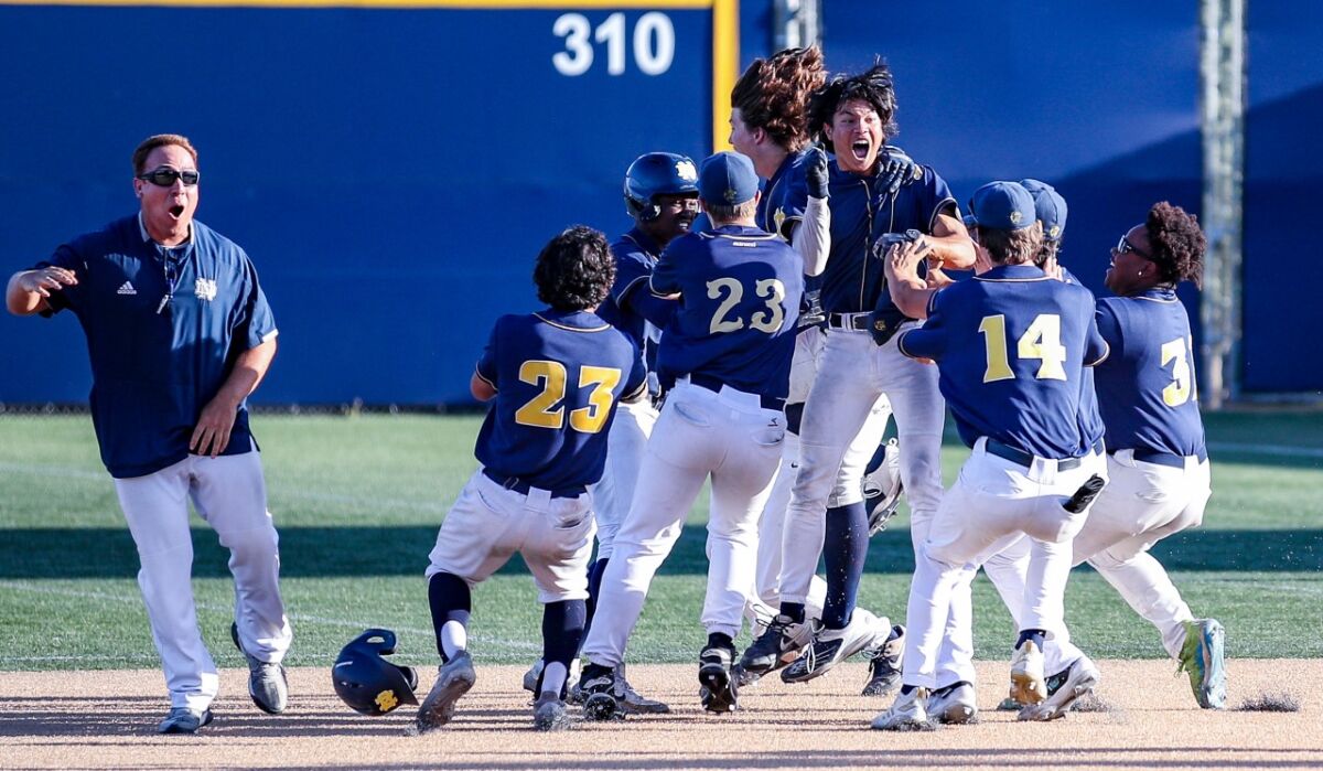Sherman Oaks Notre Dame players celebrate a win on the diamond