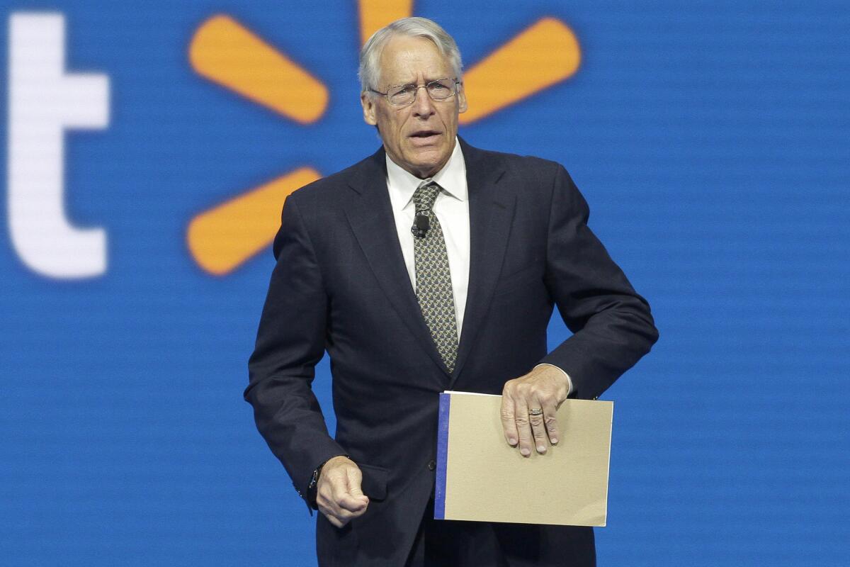 FILE - Walmart Chairman Rob Walton speaks at the company shareholders meeting in Fayetteville, Ark., June 5, 2015. The Walton family has won the bidding to purchase the Denver Broncos in the most expensive deal for a sports franchise anywhere in the world. The Broncos announced late Tuesday night, June 7, 2022, that they had entered into a sale agreement with the Walton-Penner ownership group led by Walmart heir Rob Walton, his daughter, Carrie Walton Penner, and her husband, Greg Penner. (AP Photo/Danny Johnston, File)