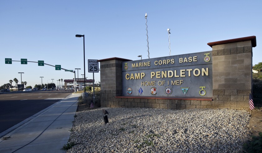 FILE - This Nov. 13, 2013 file photo shows the main gate of Camp Pendleton Marine Base at Camp Pendleton