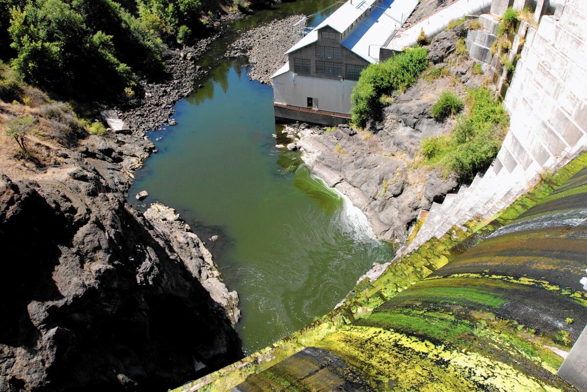 Water trickles over a dam on the Klamath River outside Hornbrook, Calif. The demise of a deal to end decades of feuding on the river could rekindle old battles over water use and dams in this remote corner of the state.