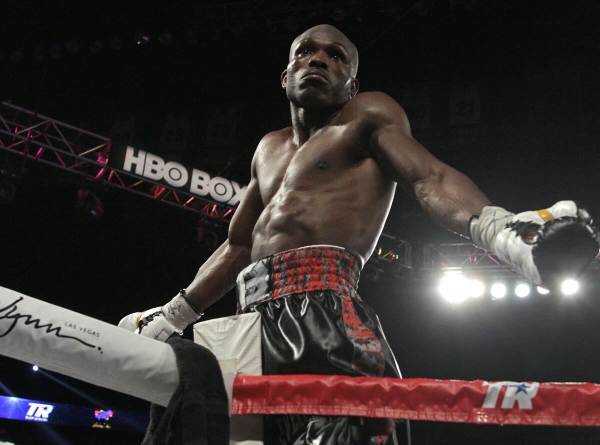 WBO welterweight champion Timothy Bradley Jr. celebrates on the ropes after knocking out Brandon Rios.