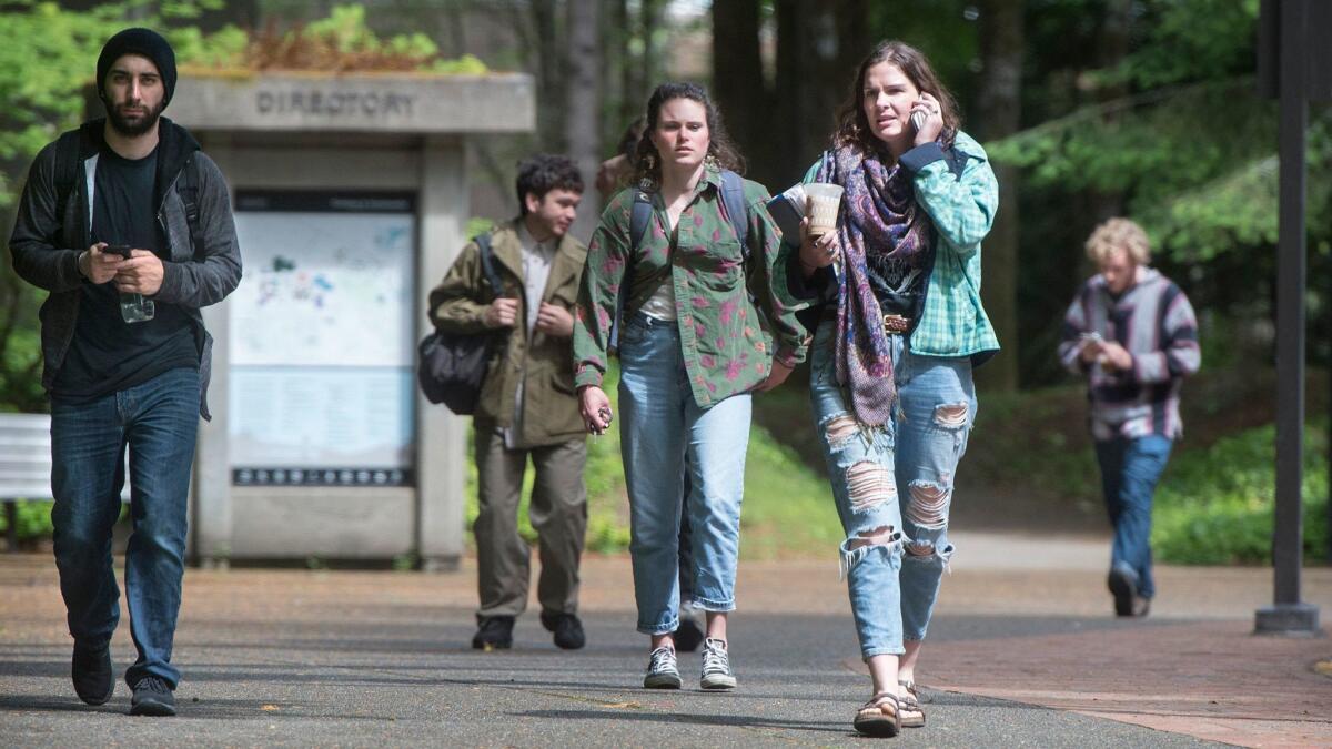 Students leave the Evergreen State College campus in Olympia, Wash. on June 1, after protests on the progressive campus drew national attention.