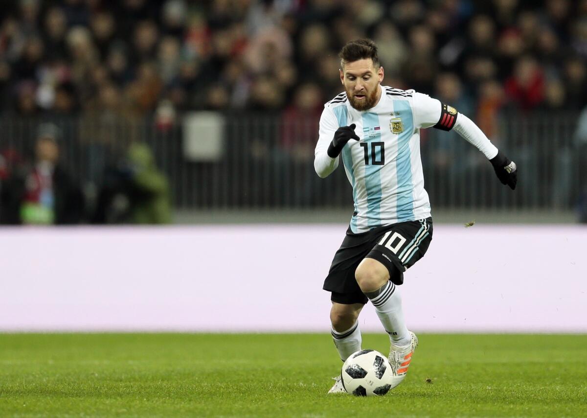 FILE - In this Saturday, Nov. 11, 2017 filer, Argentina's Lionel Messi controls the ball during the international friendly soccer match between Russia and Argentina at Luzhniki stadium in Moscow.
