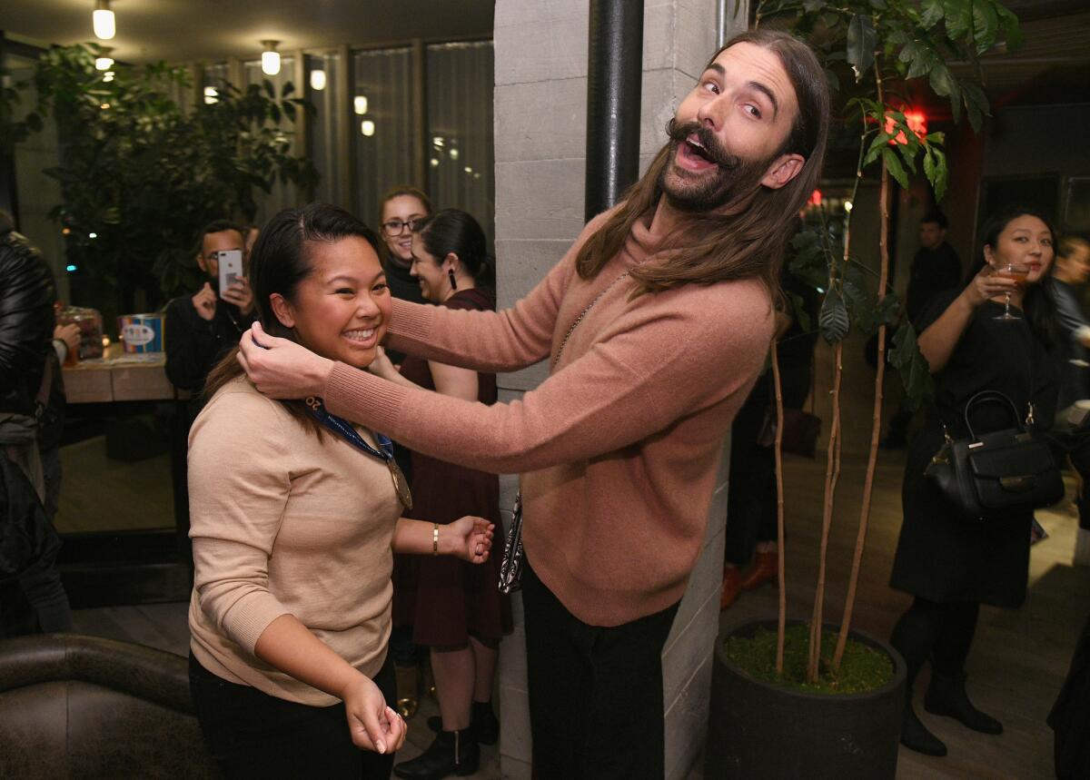 Jonathan Van Ness poses with guest at the premiere of all-new docuseries on Nov. 5 in Brooklyn, NY.