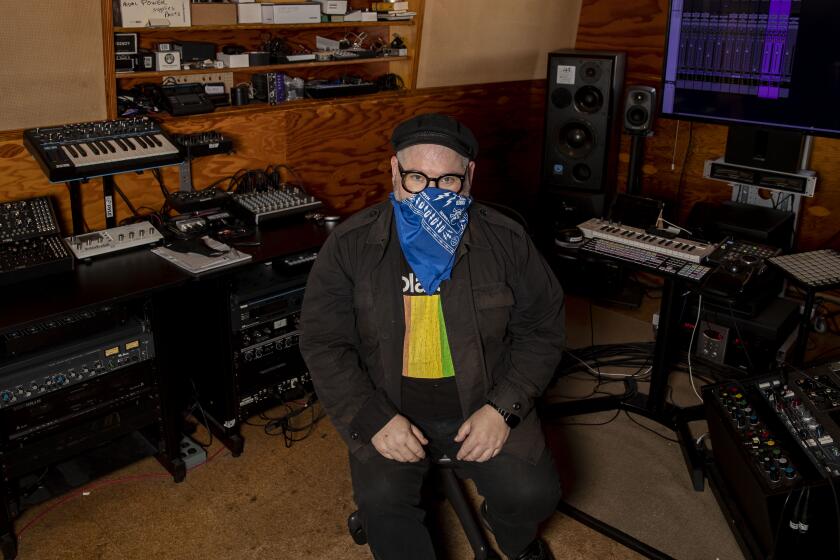 SILVERLAKE, CA - APRIL 28: Studio owner and producer Dave Trumfio sits for portraits at his home studio on Tuesday, April 28, 2020 in Silverlake, CA. (Brian van der Brug / Los Angeles Times)