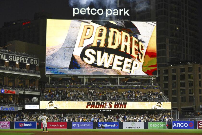 San Diego Padres second baseman Xander Bogaerts (2) looks on after the Padres beat the Los Angeles Dodgers 8-1 in a baseball game, Wednesday, July 31, 2024, in San Diego. (AP Photo/Denis Poroy)