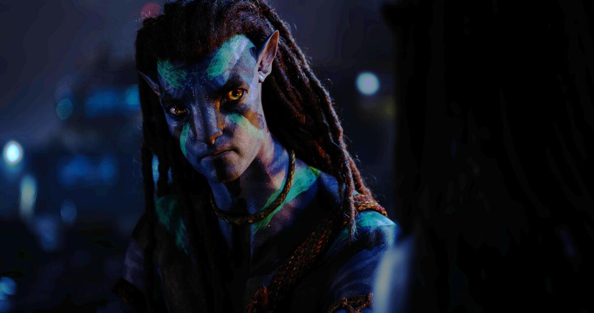 This image released by 20th Century Studios shows Sam Worthington, as Jake Sully, in a scene from "Avatar: The Way of Water." (20th Century Studios via AP)