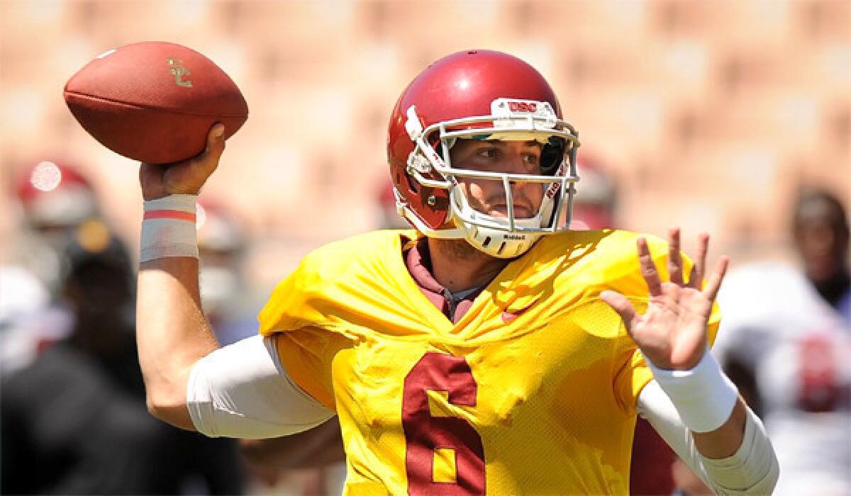 USC quarterback Cody Kessler took snaps with the Trojans' first team offense during a scrimmage at the Coliseum on Thursday.