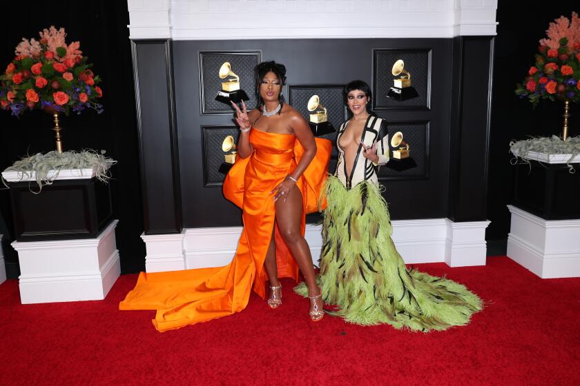 Los Angeles, CA - March 14: Megan Thee Stallion and Doja Cat on the red carpet at the 63rd Annual Grammy Awards, at the Los Angeles Convention Center, in downtown Los Angeles, CA, Wednesday, Mar. 14, 2021. (Jay L. Clendenin / Los Angeles Times)