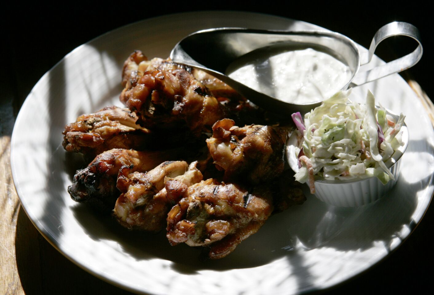 Muldoon's Irish Pub in Newport Beach features whiskey-marinated chicken wings with blue cheese dressing.