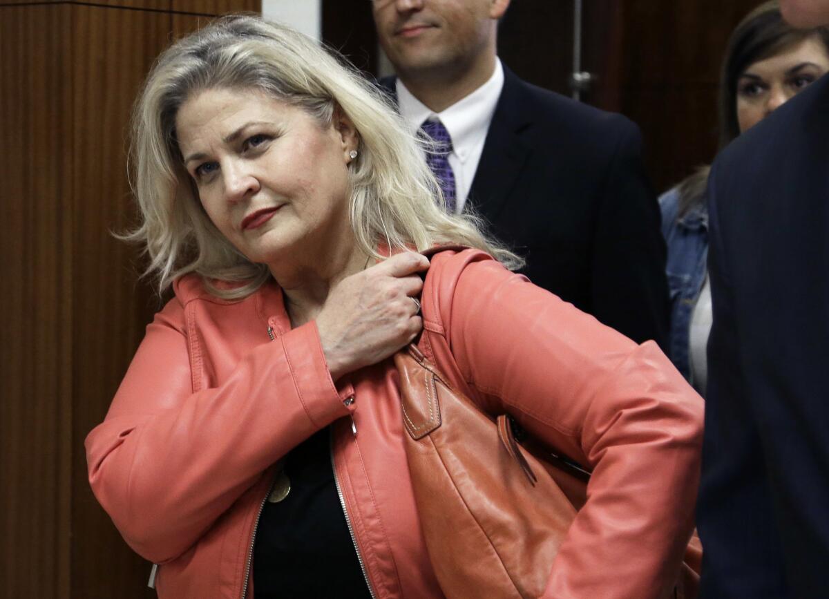Sandra Merritt leaves the courtroom on Feb. 3, 2016 in Houston.