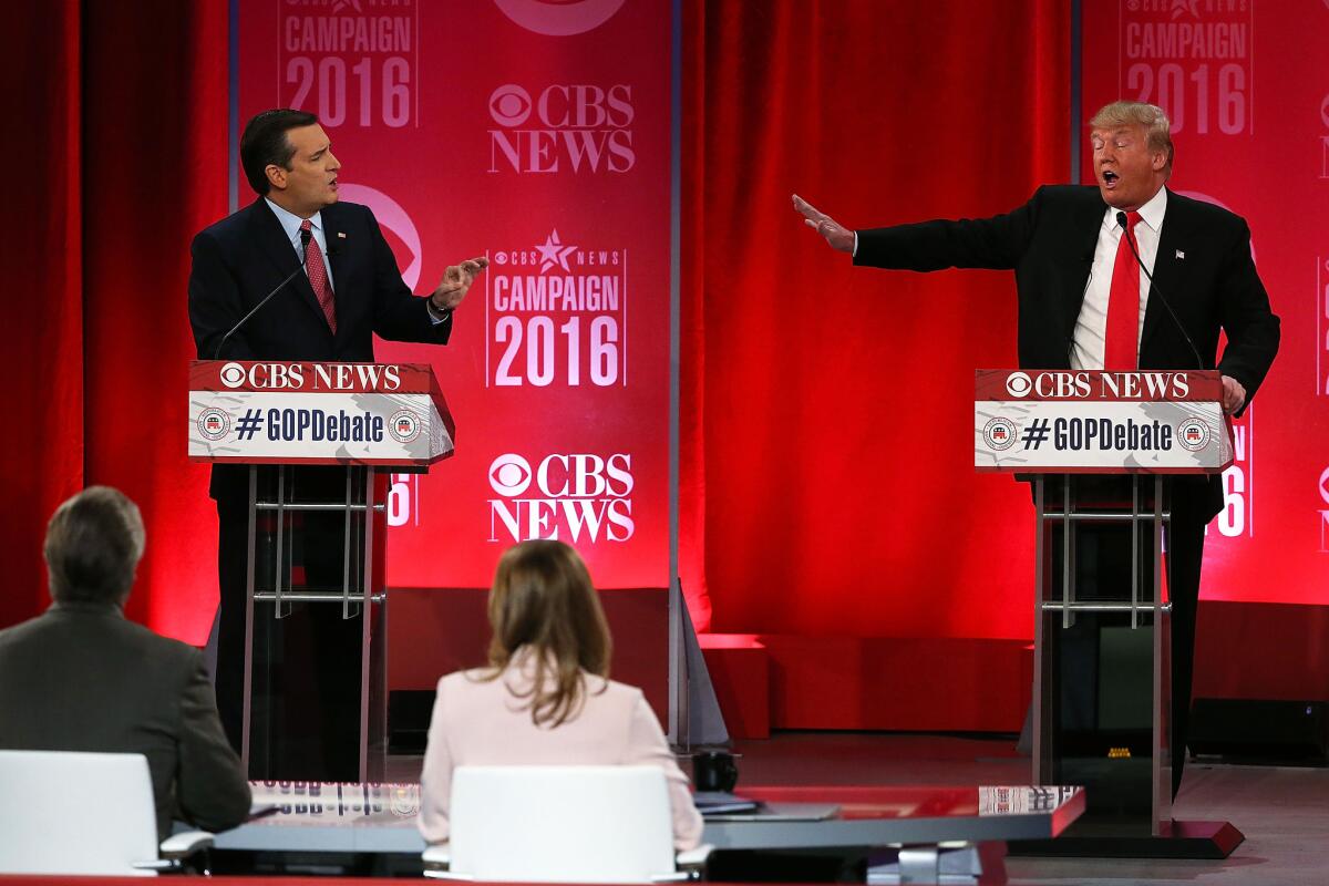 Republican presidential candidates Ted Cruz and Donald Trump participate in a debate in Greenville, S.C., on Feb. 13.