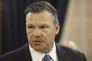 Kansas Attorney General Kris Kobach answers questions during a news conference about a new state law that defines male and female in state law so that transgender people can't change their driver's licenses and birth certificates to reflect their gender identities, Monday, June 26, 2023, at the Statehouse in Topeka, Kansas. The number of people making those changes jumped more than 300% this year ahead of the new law taking effect. (AP Photo/John Hanna)