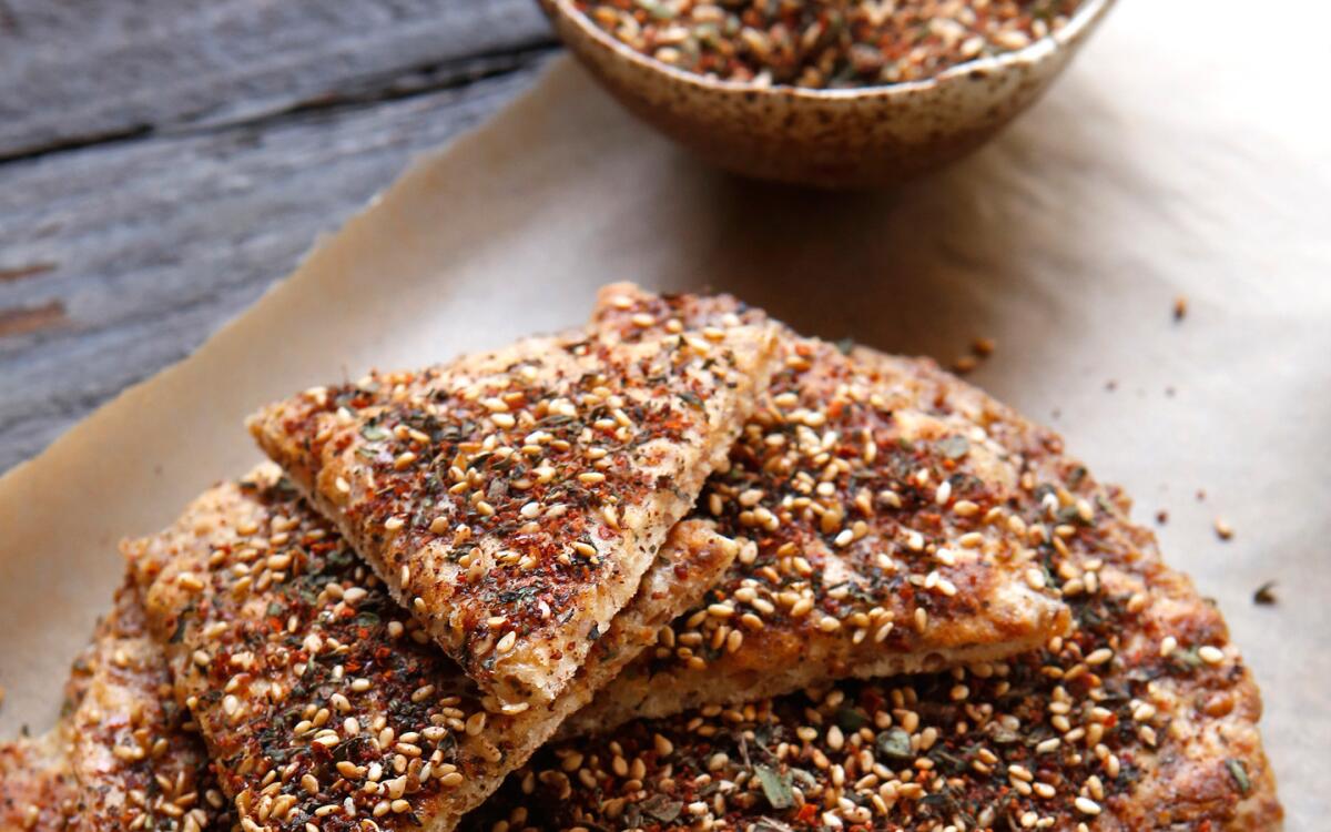 Cracked wheat mana’esh (flatbread with za’atar)