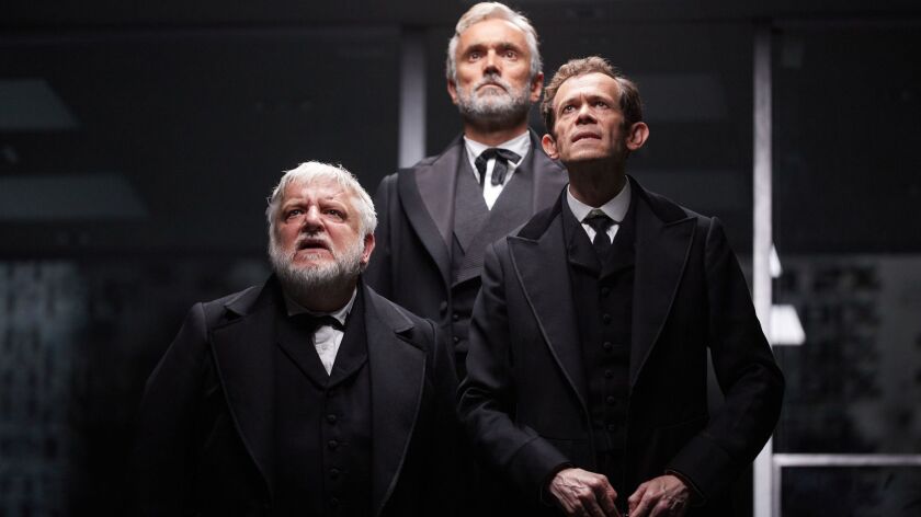 Simon Russell Beale, left, Ben Miles and Adam Godley in "The Lehman Trilogy" at London's National Theatre