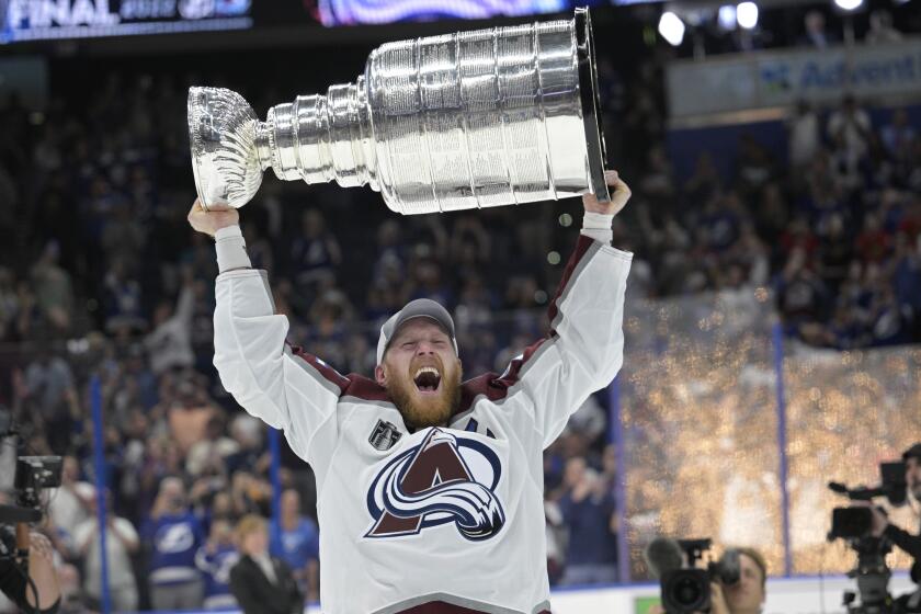 Colorado Avalanche left wing Gabriel Landeskog lifts the Stanley Cup after the team.