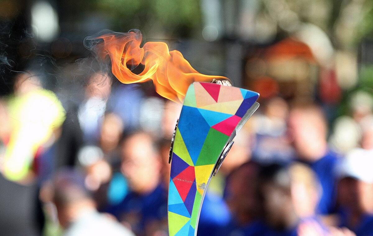 The flame burning in the 2015 Special Olympic Torch at the 2015 Law Enforcement Torch Run Final Leg for Special Olympics ceremony at the Americana at Brand in Glendale on Wednesday, July 22, 2015. Law enforcement nationwide gathered in Glendale, one of the Special Olympics host cities, for the torch run. (Tim Berger/Staff Photographer)