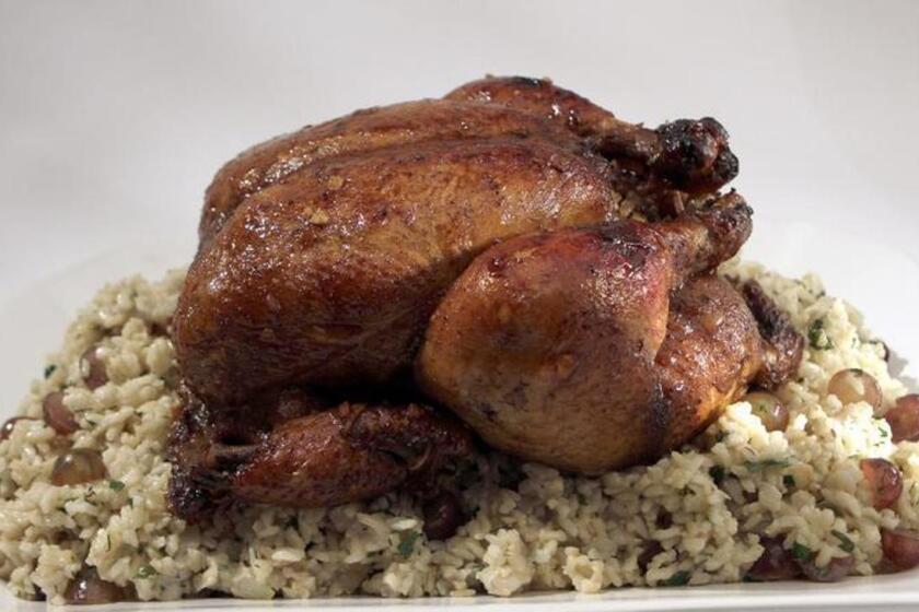 A Rosh Hashana main dish could be chicken marinated with pomegranate molasses, honey and spices and stuffed with brown rice. Recipe