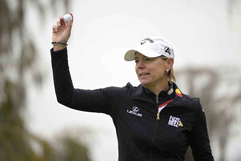 Annika Sorenstam, of Sweden, acknowledges the crowd after putting on the 18th green during the final round of the Tournament of Champions LPGA golf tournament, Sunday, Jan. 23, 2022, in Orlando, Fla. (AP Photo/Phelan M. Ebenhack)