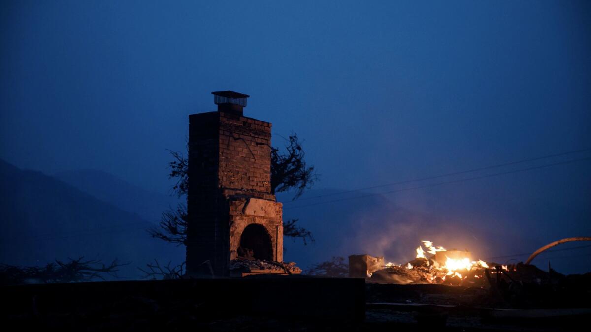 A chimney is all that stands after being consumed by the Thomas fire in Ventura.