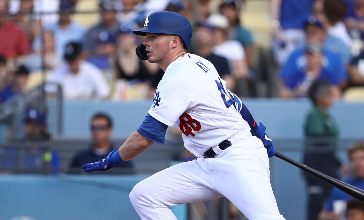 Dodgers second baseman Gavin Lux singles on his first major league pitch during the second inning against the Colorado Rockies on Monday.