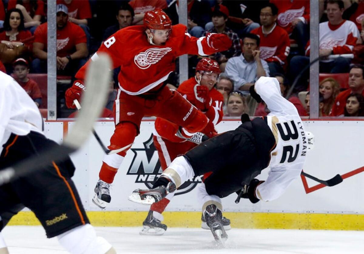 Detroit Red Wings' Justin Abdelkader checks Anaheim Ducks' Toni Lydman during the second period of Game 3.