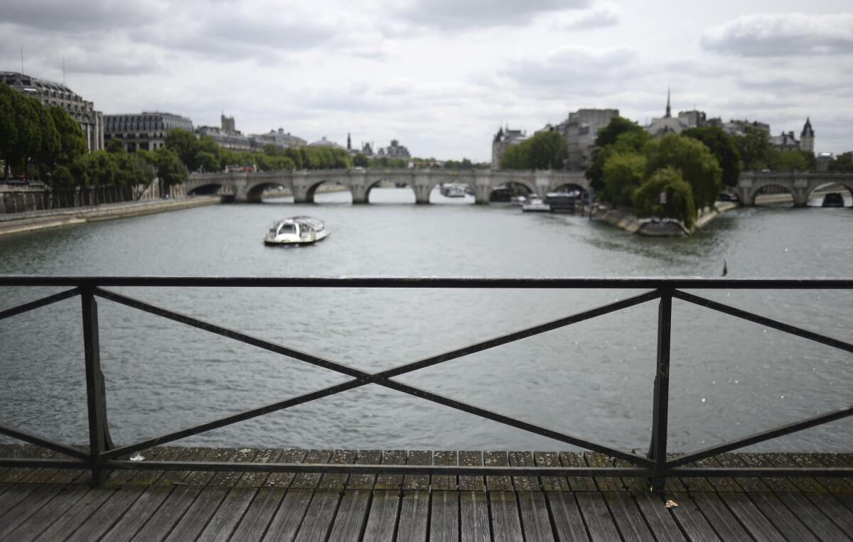 After the love locks were removed from Pont des Arts in Paris.