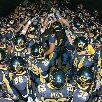 The California Golden Bears come together for a cheer before the start of their Pac-10 game against the UCLA Bruins at Memorial Stadium on October 16, 2004 in Berkeley, California.