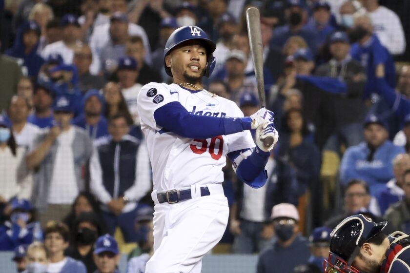 Los Angeles, CA - October 20: Los Angeles Dodgers' Mookie Betts looks back after striking out.