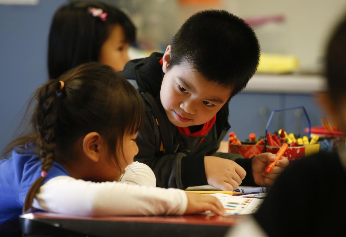 Kindergarten students in DeMille Elementary, a public school in Midway City.