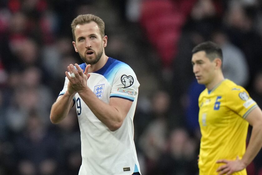 Englands' Harry Kane reacts during the Euro 2024 group C qualifying soccer match between England and Ukraine at Wembley Stadium in London, Sunday, March 26, 2023. (AP Photo/Alastair Grant)