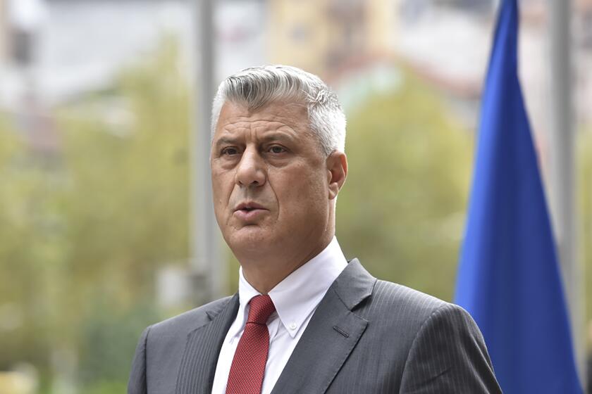 Kosovo president Hashim Thaci addresses the nation as he announced his resignation to face war crimes charges in Kosovo capital Pristina on Thursday, Nov. 5, 2020. Thaci, a guerrilla leader during Kosovo’s war for independence, has resigned in order to face charges for war crimes and crimes against humanity issued by at a special court based in The Hague, Netherlands. Thaci announced his resignation at a news conference on Thursday. He said he was taking the step “to protect the integrity of the presidency of Kosovo.” (AP Photo/Visar Kryeziu)