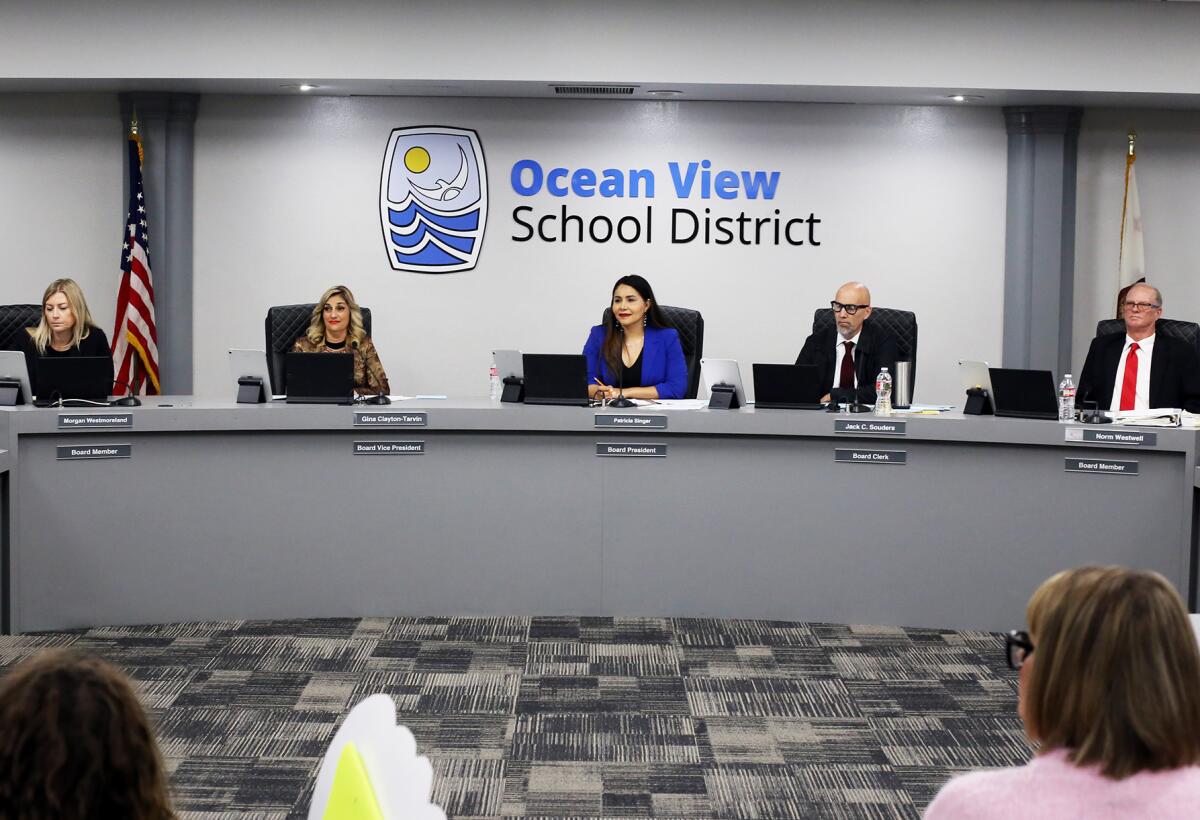 Ocean View School District Board of Trustees members listen to public comments at a meeting in November 2023.