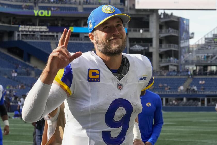 Los Angeles Rams quarterback Matthew Stafford leaves the field after their win.