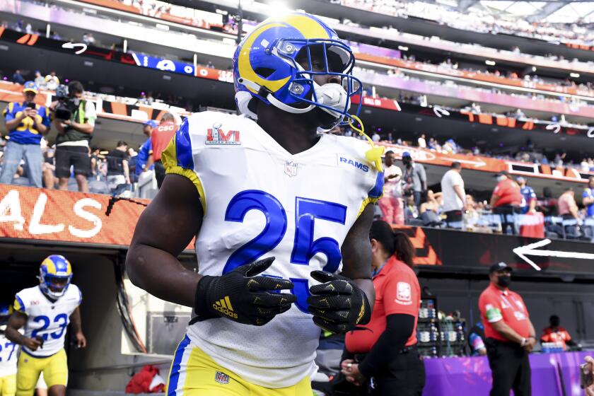 Los Angeles Rams quarterback Matthew Stafford connects with wide receiver  Tutu Atwell downfield for a 31-yard touchdown