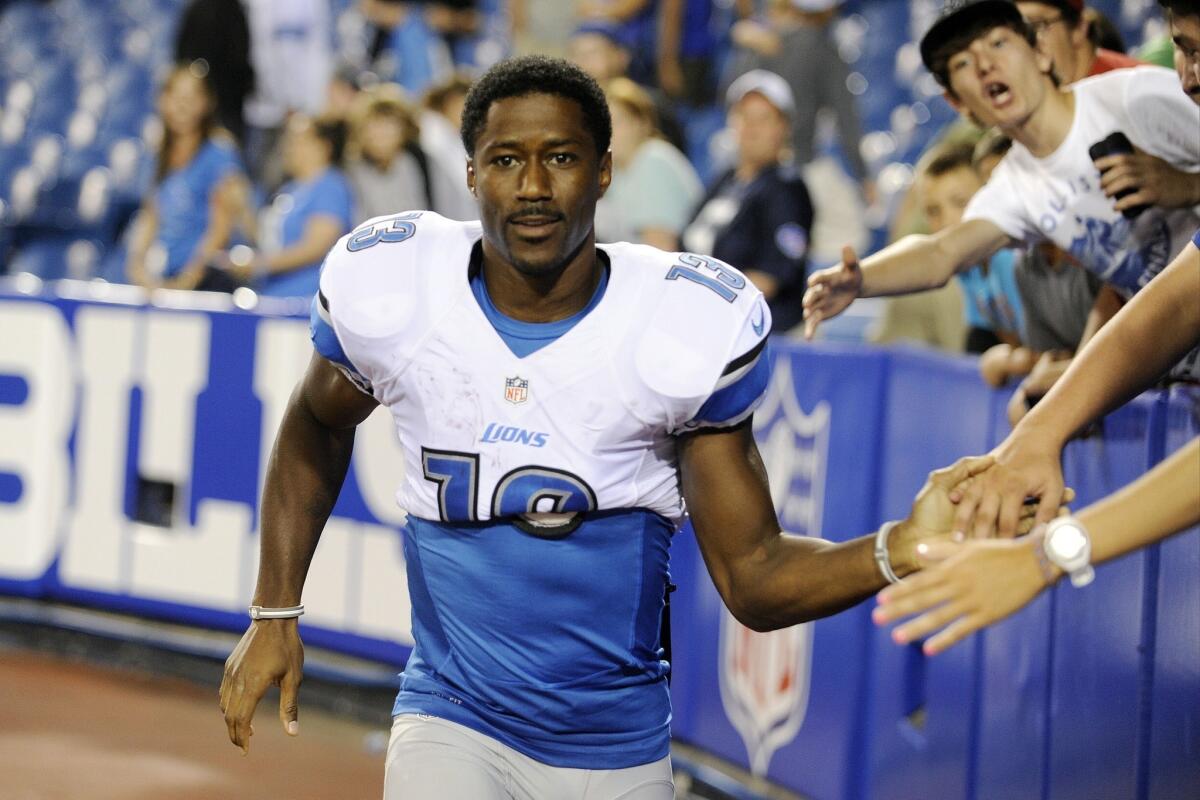 Detroit's leading receiver, Nate Burleson, seen in August, broke his arm in a car accident early Tuesday.