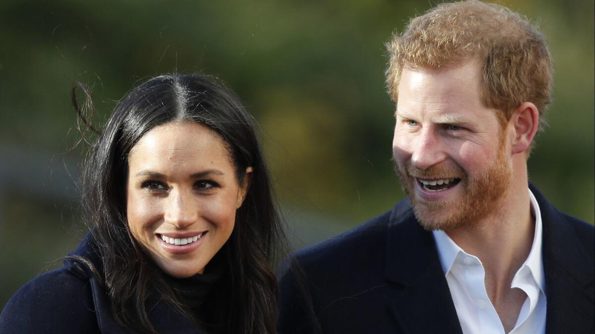 Prince Harry and Meghan Markle arrive at Nottingham Academy in England in 2017.