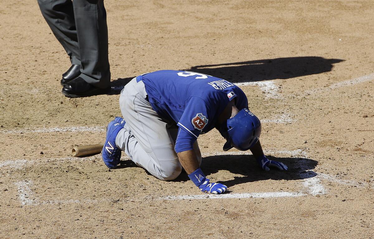 Dodgers outfielder Andre Ethier falls after fouling a ball off his right shin, sustaining a fracture, during a game in March against the Arizona Diamondbacks.