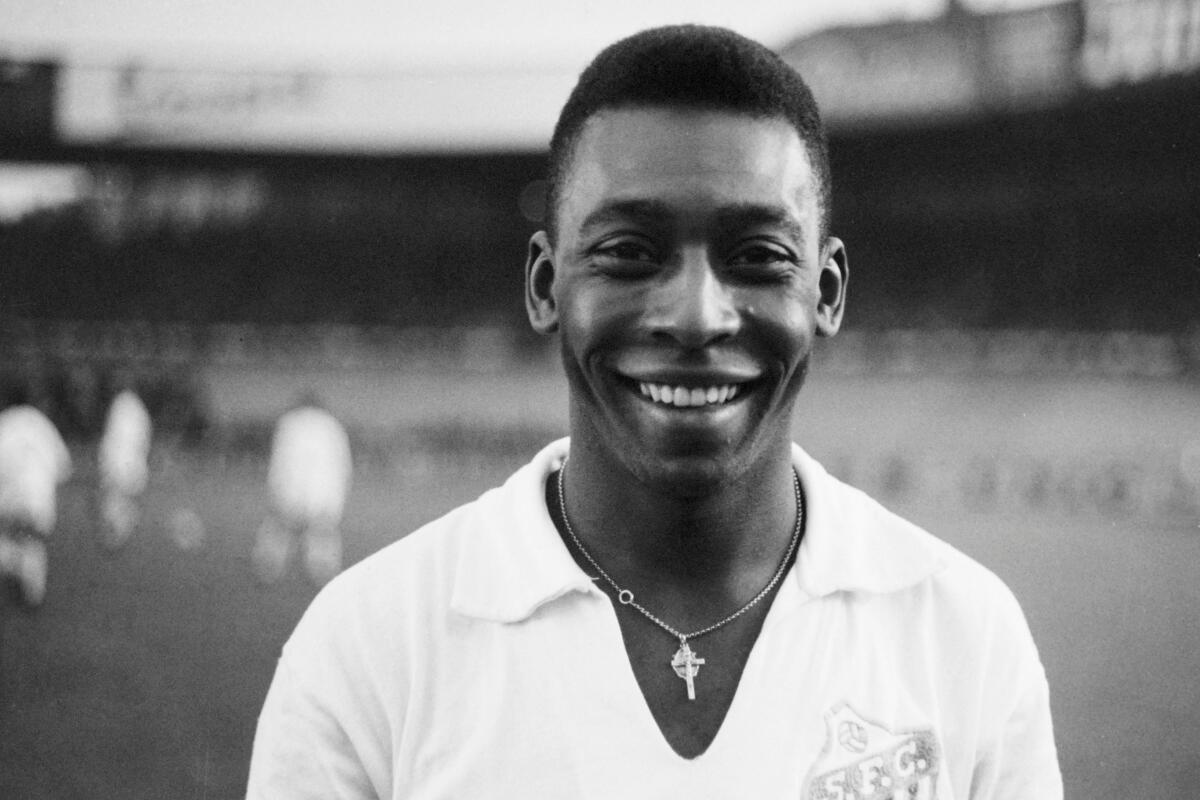 Brazilian striker Pelé, wearing his Santos jersey, 