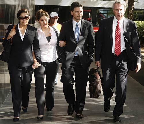 Former California Assembly Speaker Fabian Nunez, second from right, arrives with his wife, Maria, daughter Teresa and attorney Bradley Patton at San Diego County Superior Court for the arraignment of his 19-year-old son, Esteban, on a murder charge. The younger Nunez and three friends are suspects in the fatal stabbing of a San Diego college student in October. They were arrested Tuesday in Sacramento County.
