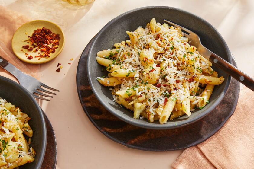 LOS ANGELES CA, SEPT. 24, 2021: Penne with Sauteed Garlic, Cauliflower and Chiles photographed for the Los Angeles Times food column on Friday Sept. 24, 2021 at Proplink Studios in Arts District Los Angeles. Prop Styling by Kate Parisan.