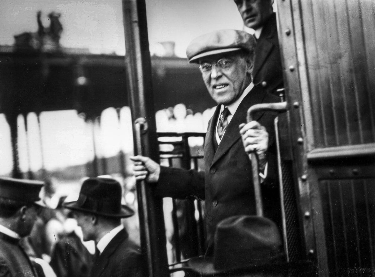 President Woodrow Wilson steps down from a train upon his arrival in Los Angeles in 1919.