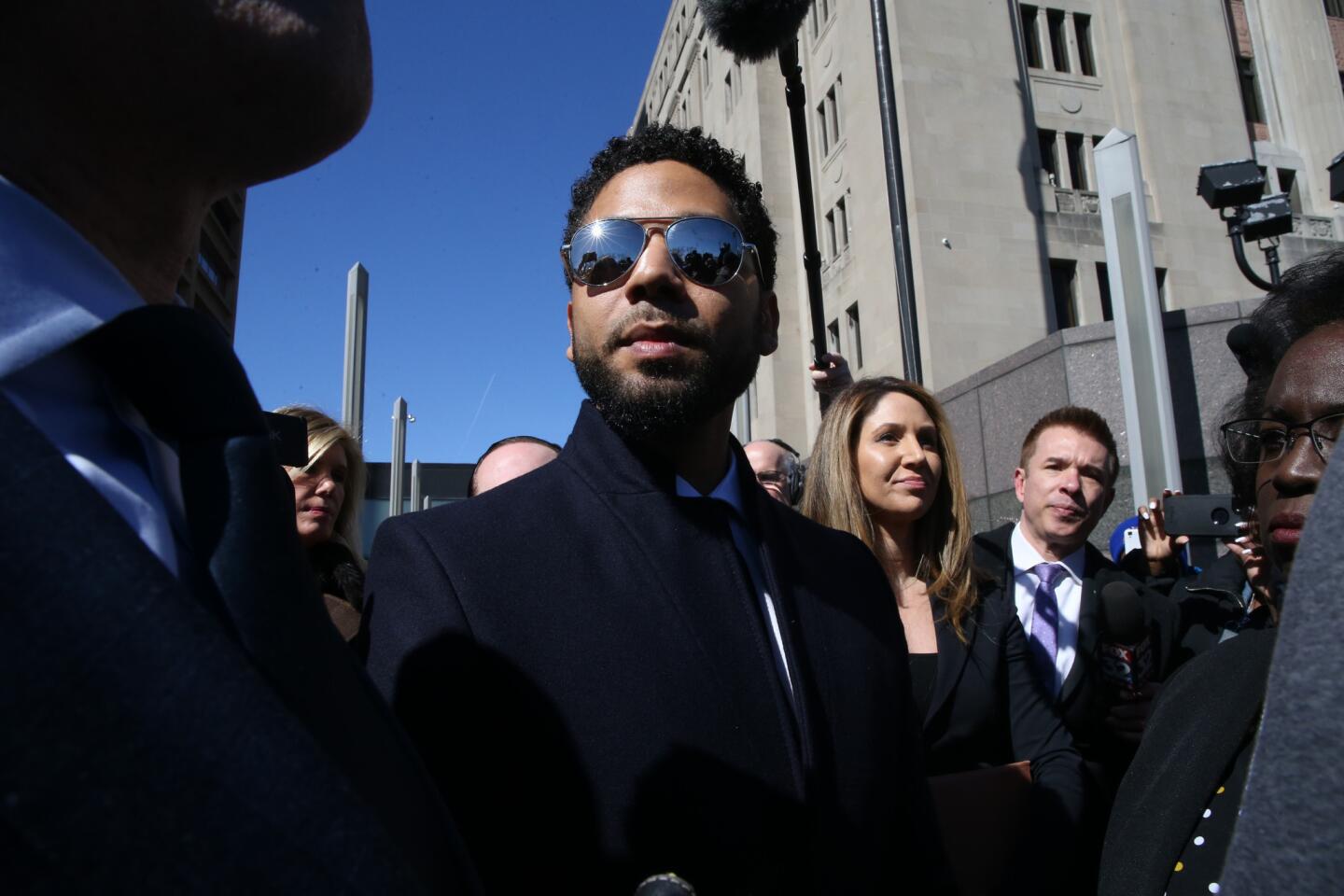 Actor Jussie Smollett leaves the Leighton Criminal Court building after all charges were dropped in his disorderly conduct case on March 26, 2019.