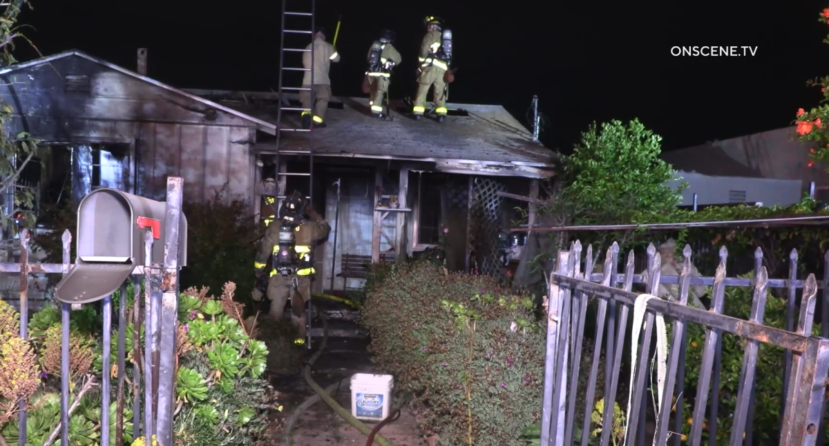 Firefighters extinguished a fire at a home in the Talmadge neighborhood early Monday.