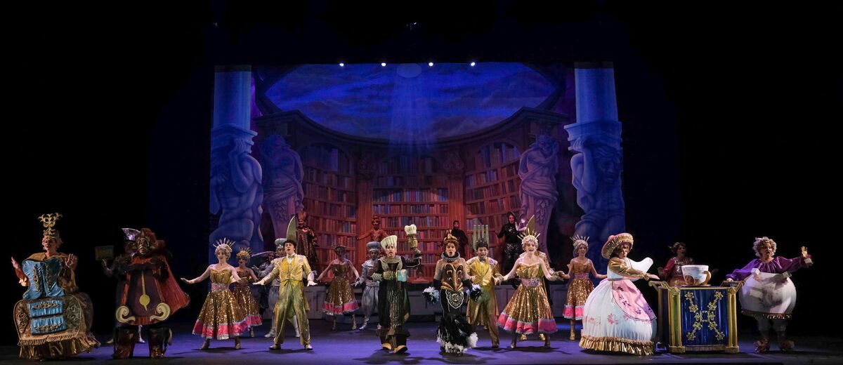 A full-cast dance scene from "Beauty and the Beast" at Moonlight Amphitheatre in Vista.