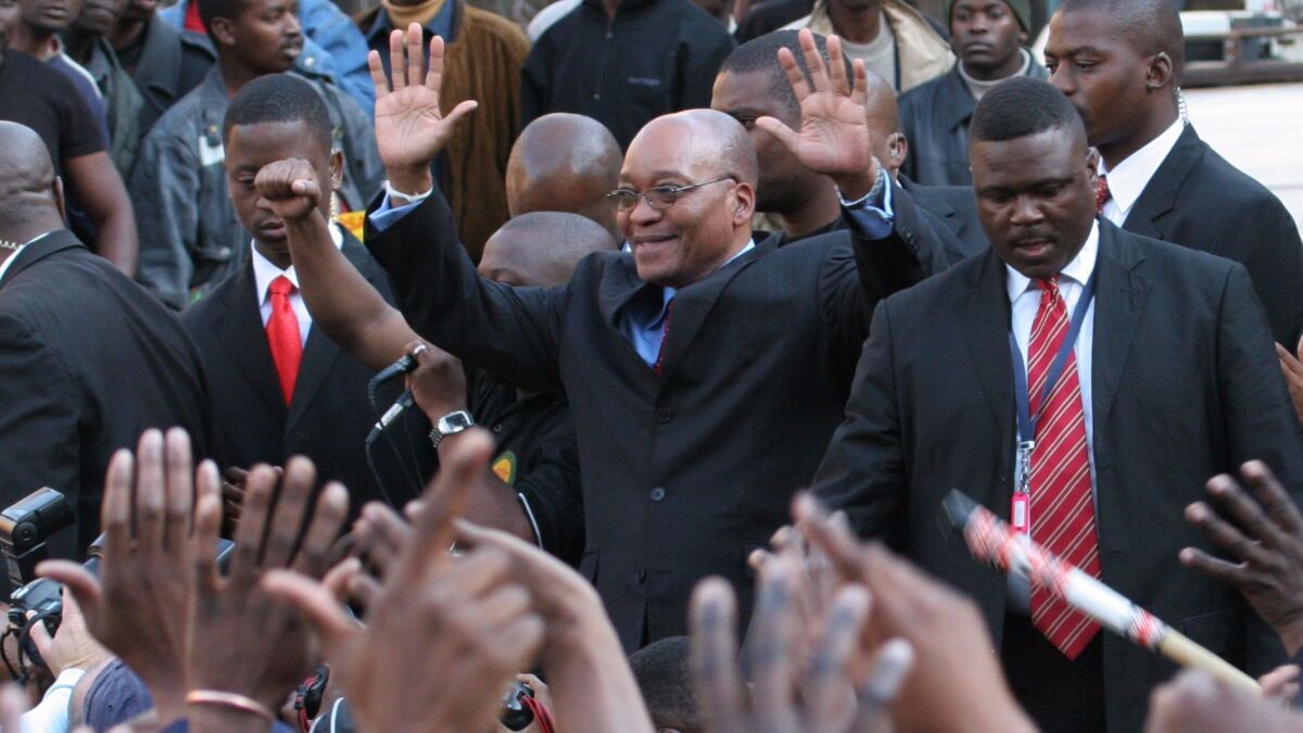 Supporters cheer Jacob Zuma after his acquittal on rape charges in 2006, clearing the way for him to become party president. (Dennis Farrell / Associated Press)