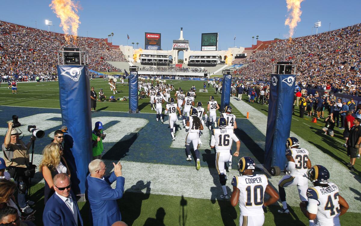 Rams players take the field for their preseason opener against the Dallas Cowboys in 2017.