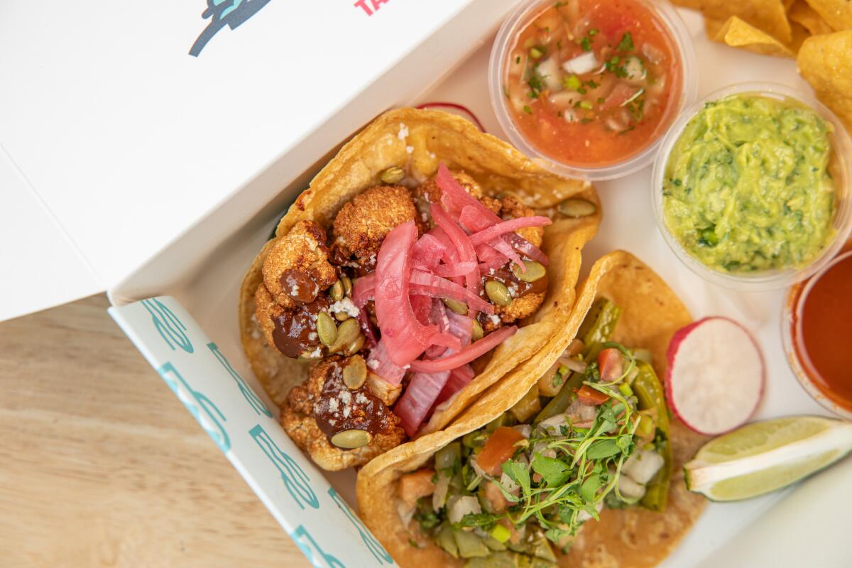 Cauliflower and nopales tacos at El Barrio Neighborhood Tacos